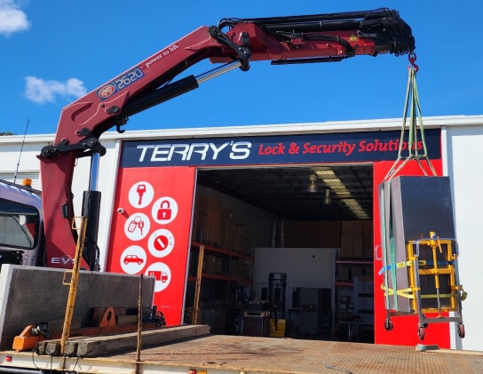 Truck Lifting a Vault — Expert Trade Services in Burleigh Heads, QLD