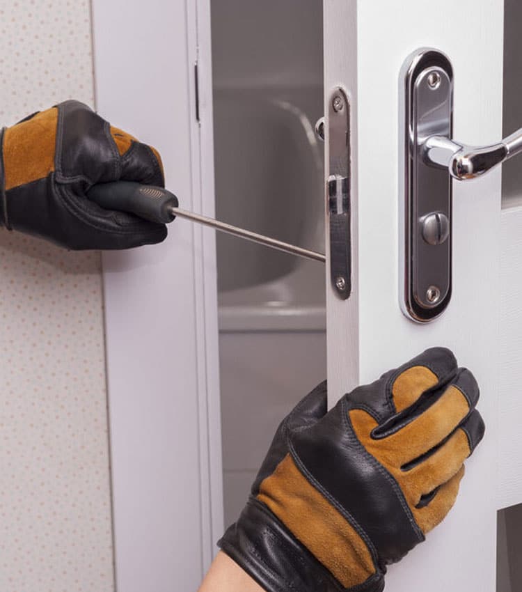 Handyman Repair The Door Lock In The Room — Expert Trade Services in Burleigh Heads, QLD