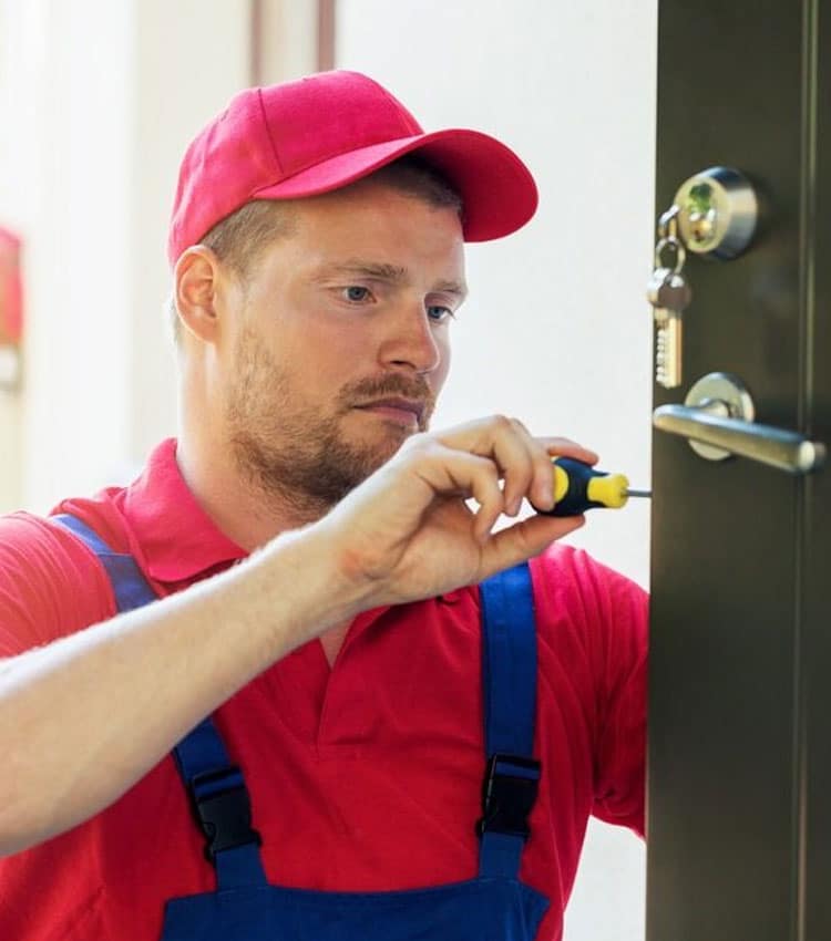 Locksmith Installing New House Door Lock — Expert Trade Services in Burleigh Heads, QLD