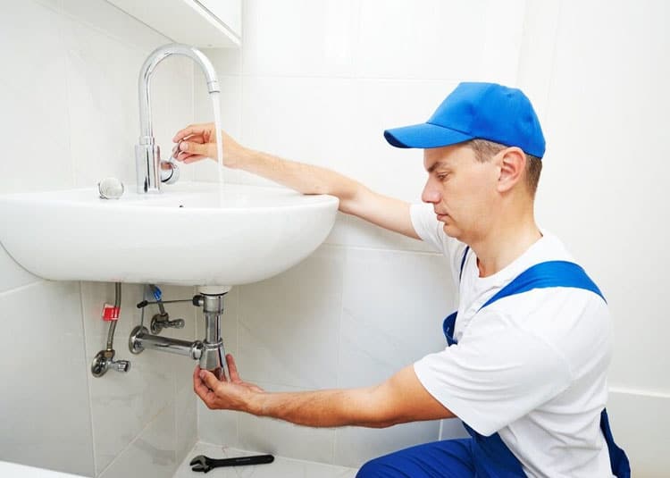 Plumber Man Repair Leakey Faucet Tap — Expert Trade Services in Burleigh Heads, QLD