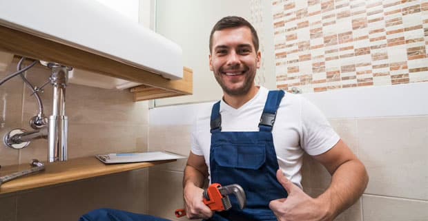 Technician Done With Plumbing — Locksmiths in Robina, QLD